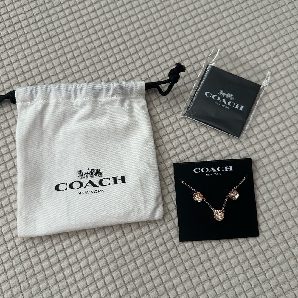 Coach Rose Gold Necklace and earrings with Crystal Charms